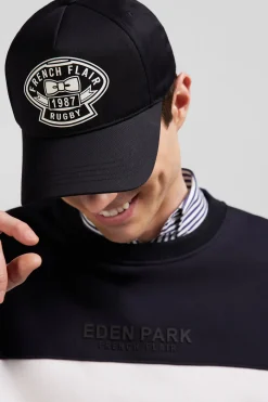 Black cotton cap with ivory embroidery