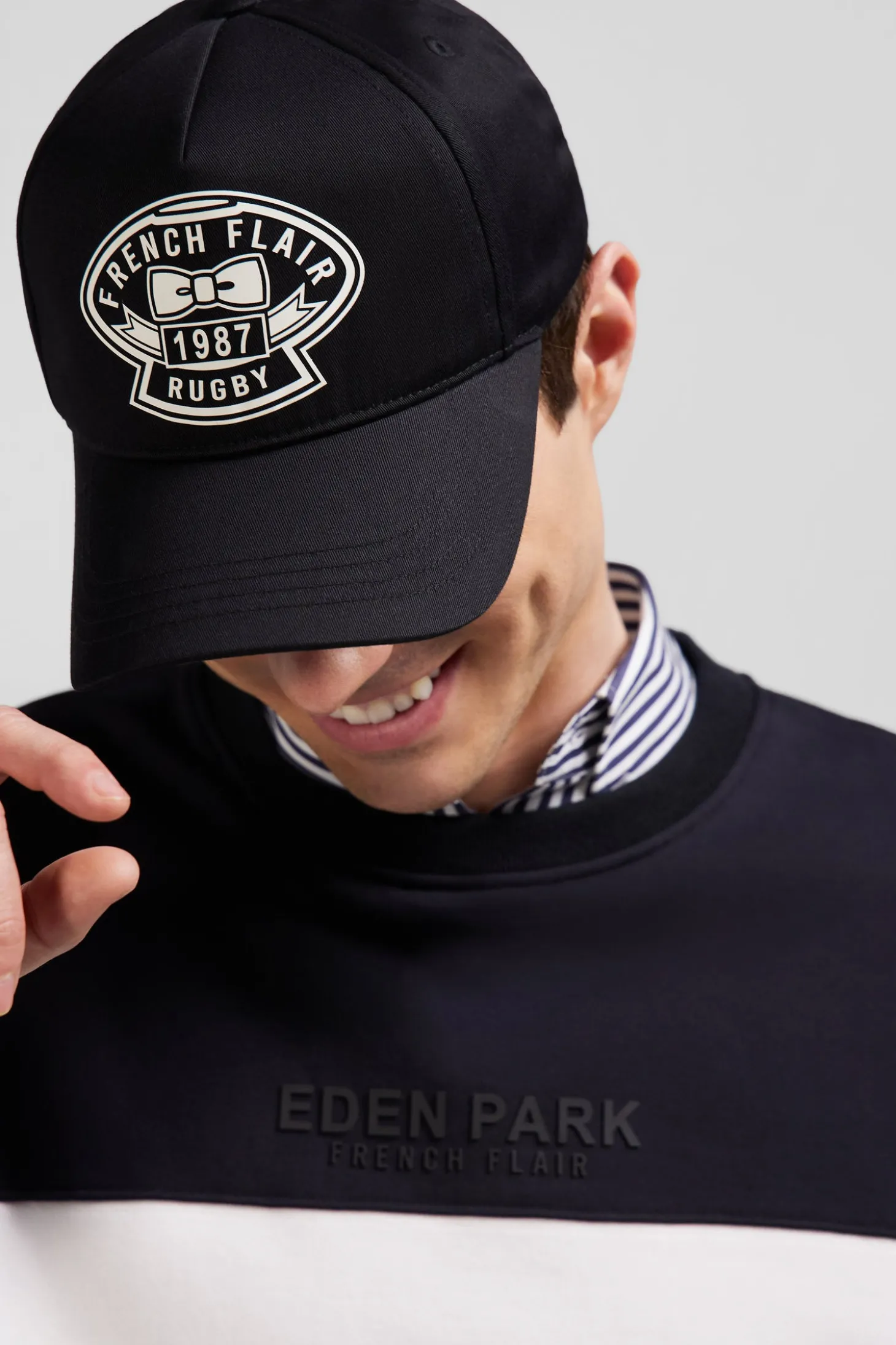 Black cotton cap with ivory embroidery