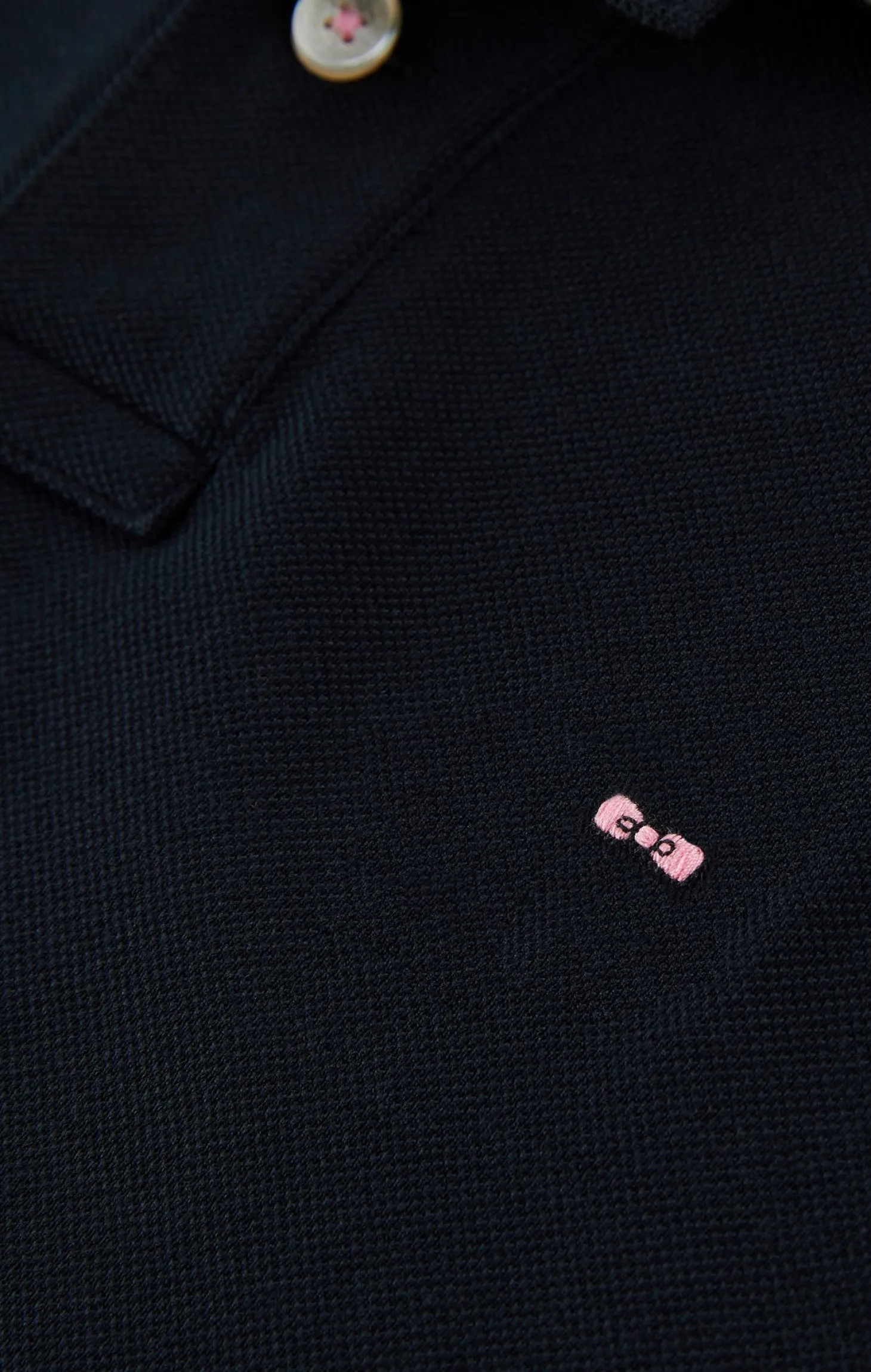 Black cotton polo with contrasting neck