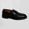 Black leather loafers