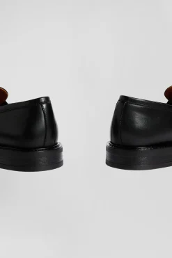 Black leather loafers
