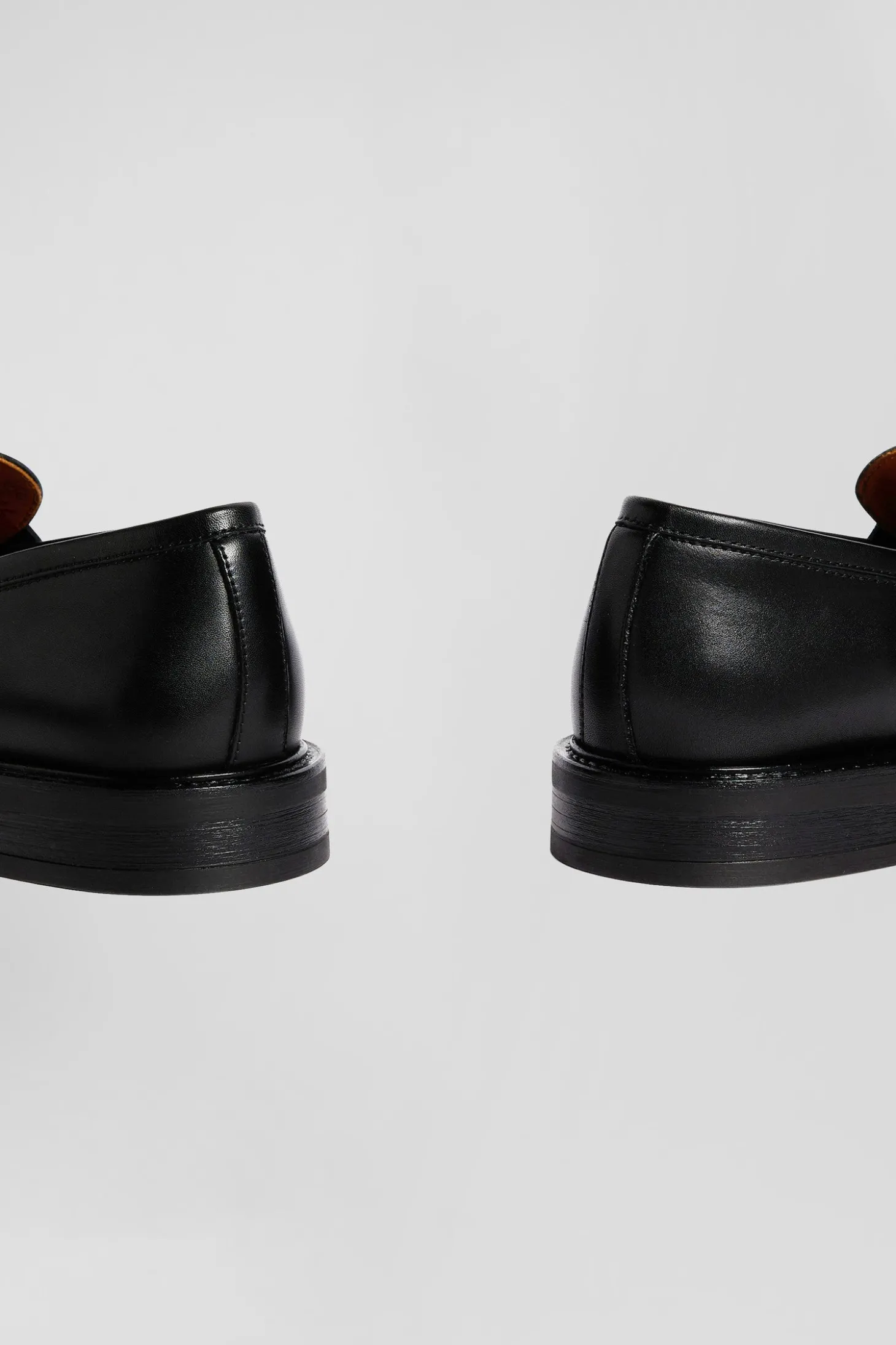 Black leather loafers