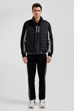 Black quilted sleeveless high collar down vest