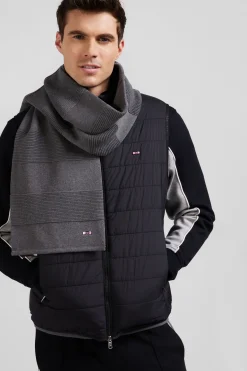 Black quilted sleeveless high collar down vest