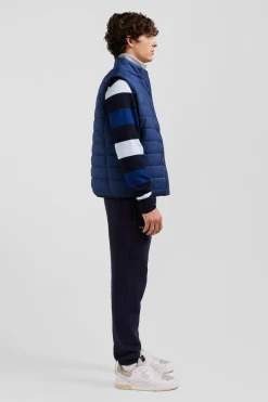 Blue quilted sleeveless high collar down vest