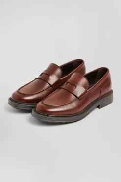 Brown polished leather loafers