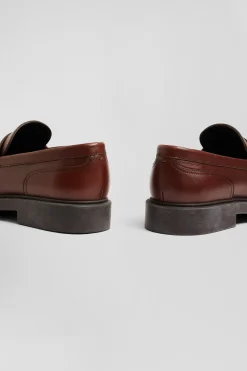 Brown polished leather loafers