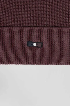 Burgundy knitted cotton beanie with tricolour details