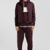 Burgundy quilted sleeveless high collar down vest