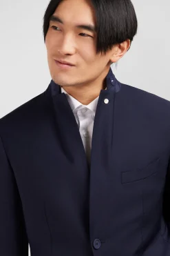 Dark blue blazer with embossed bow detail