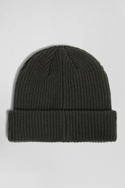 Green knitted beanie with bow tie embroidery