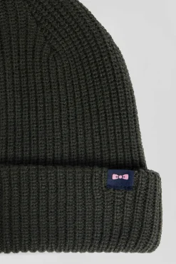 Green knitted beanie with bow tie embroidery