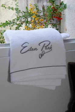 Large bath towel with grey embroidery