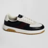 Navy blue and burgundy leather sneakers