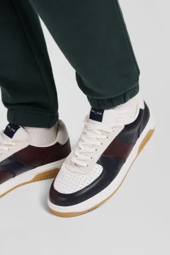 Navy blue and burgundy leather sneakers
