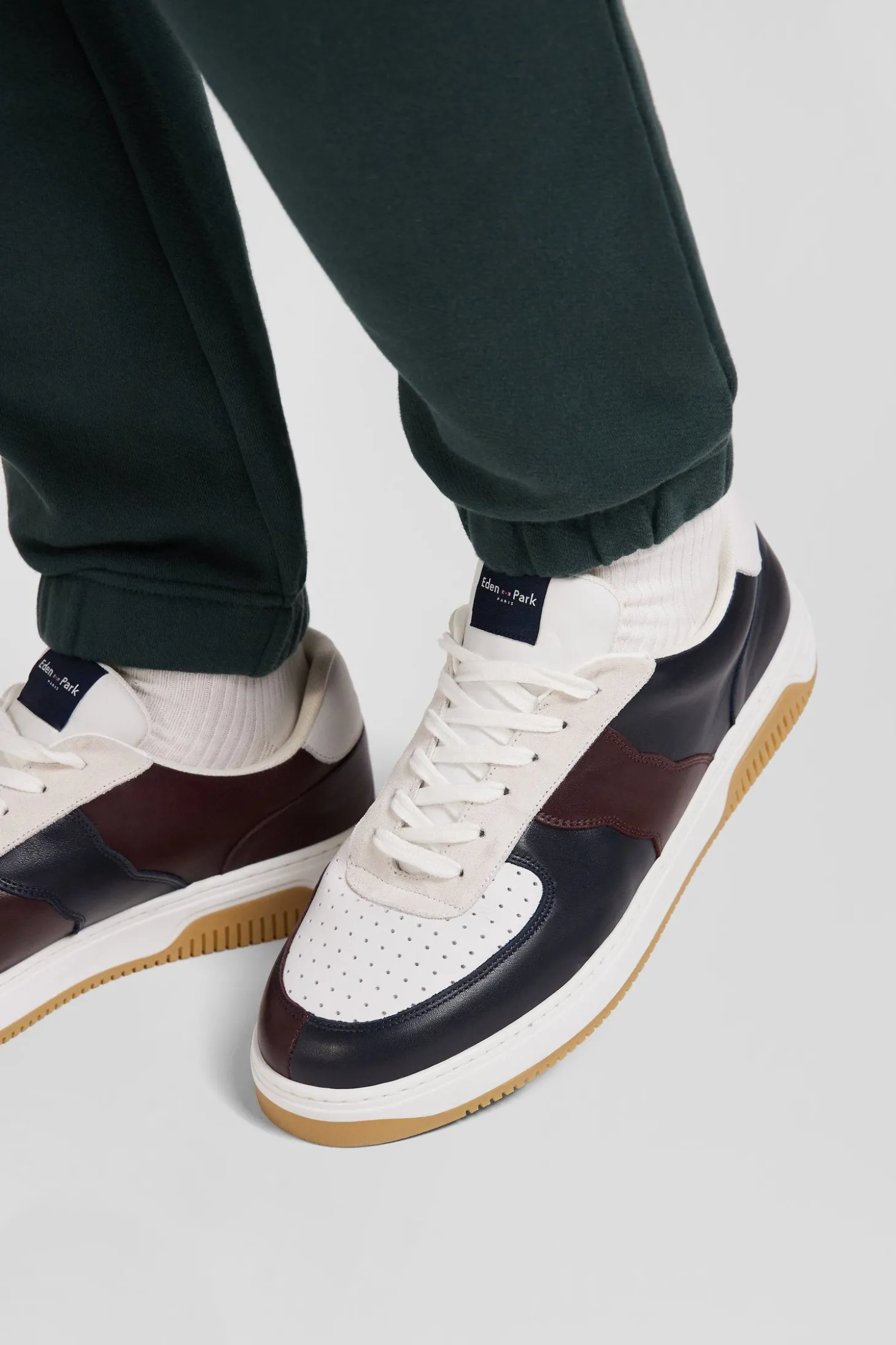 Navy blue and burgundy leather sneakers