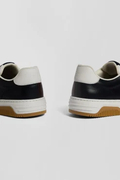 Navy blue and burgundy leather sneakers