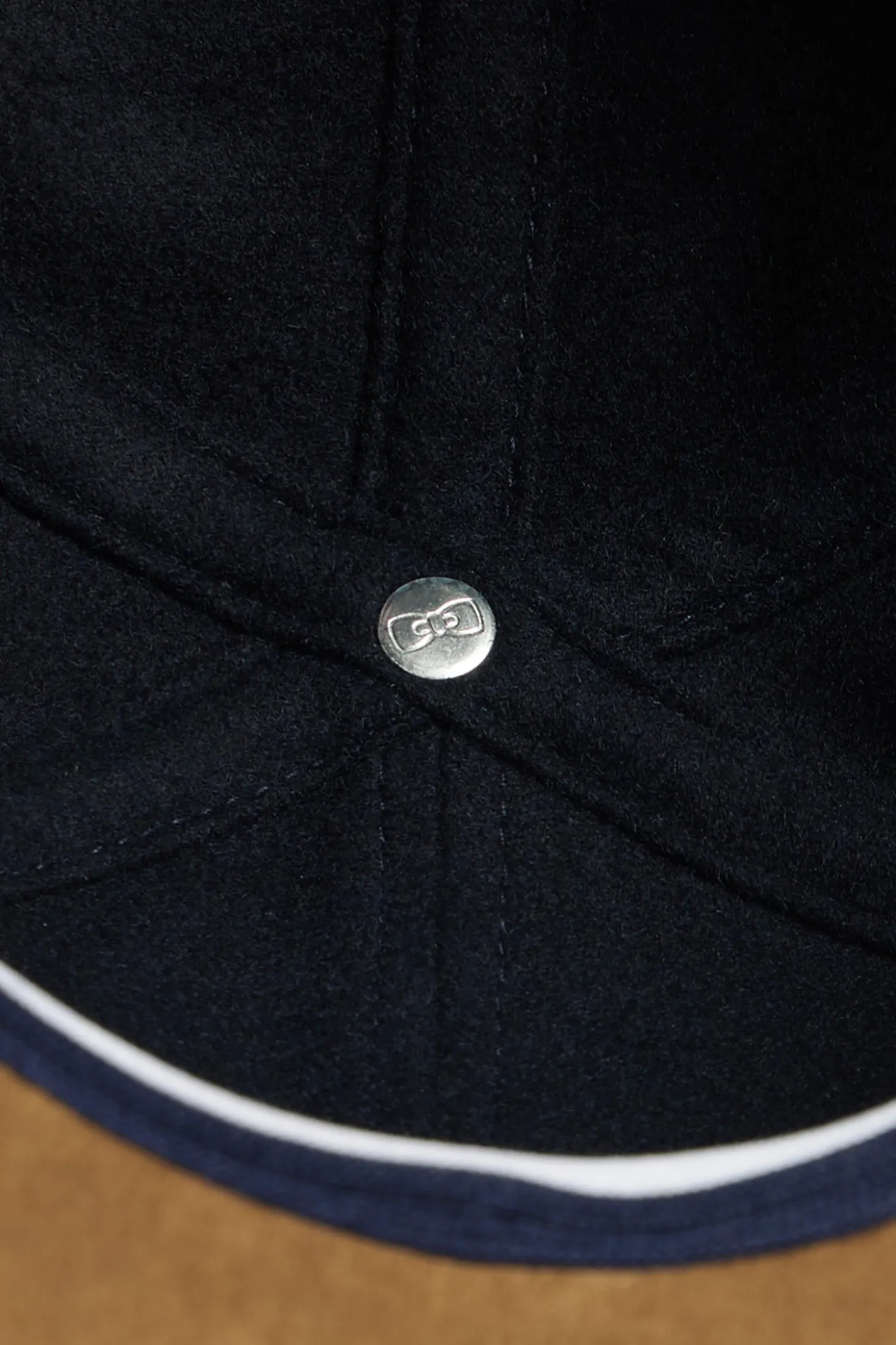 Navy blue and camel wool felt cap