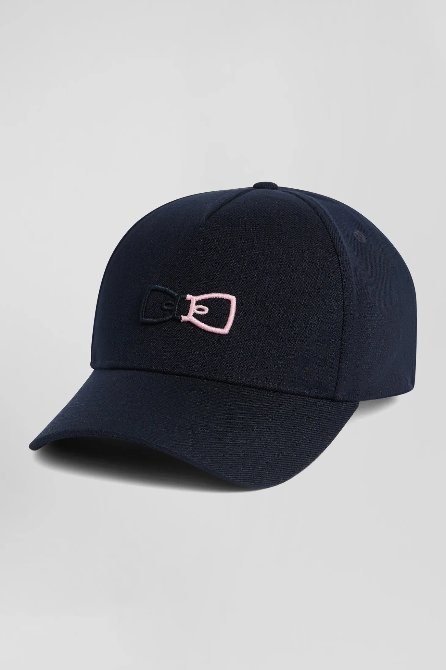 Navy blue cap with bow tie embroidery