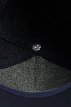 Navy blue cap with bow tie embroidery