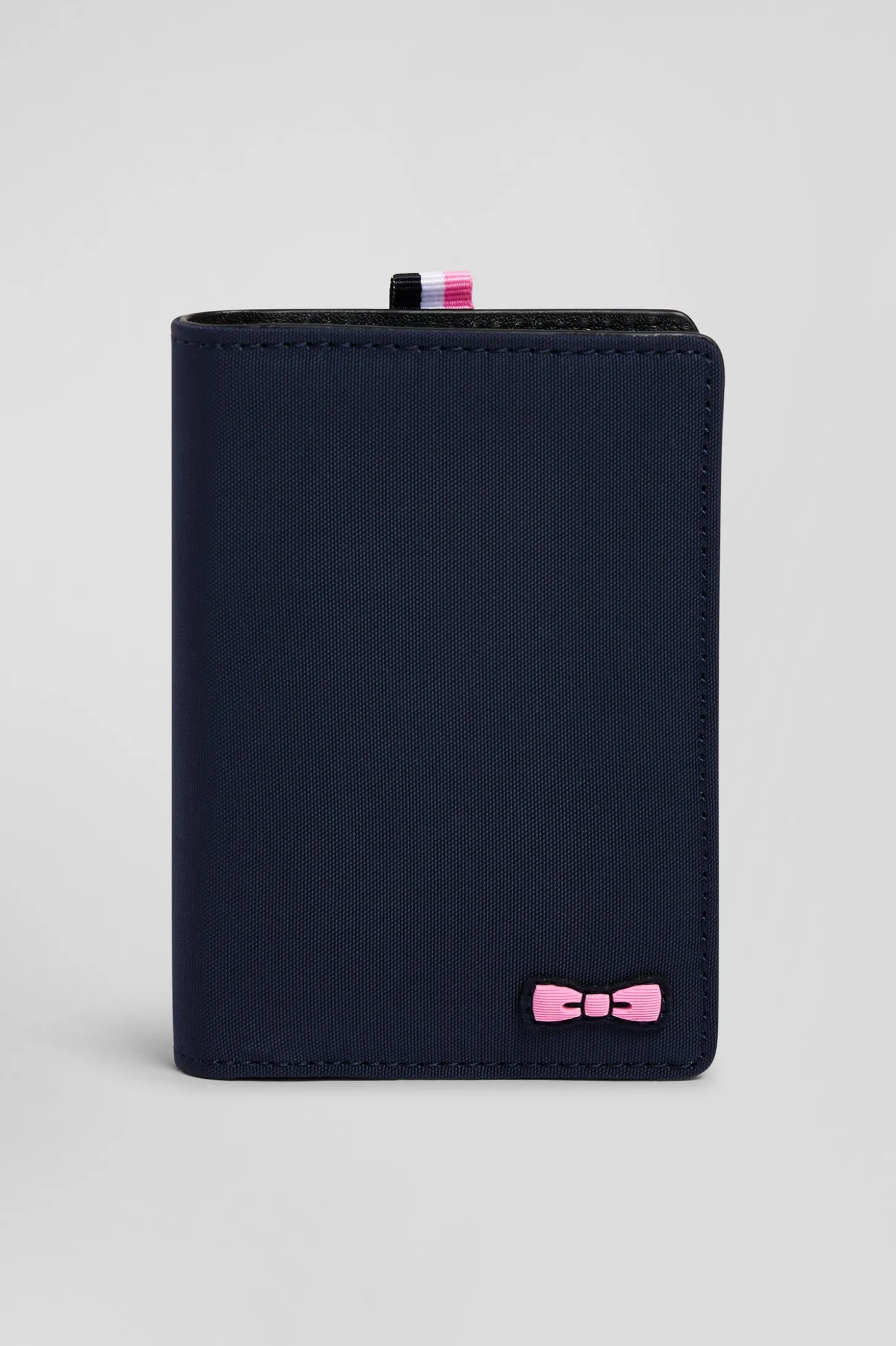 Navy blue French-style wallet with pink ribbon