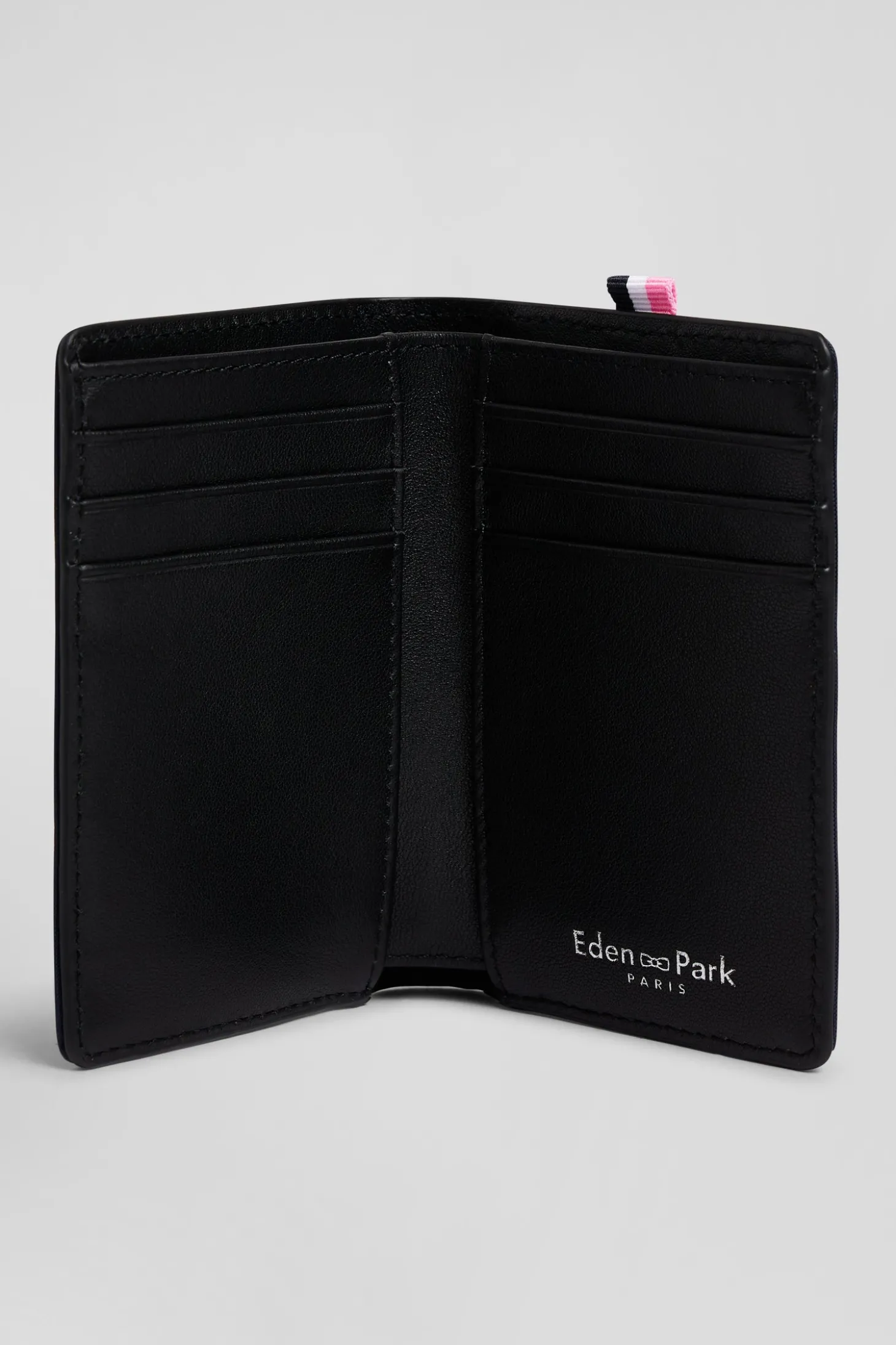 Navy blue French-style wallet with pink ribbon