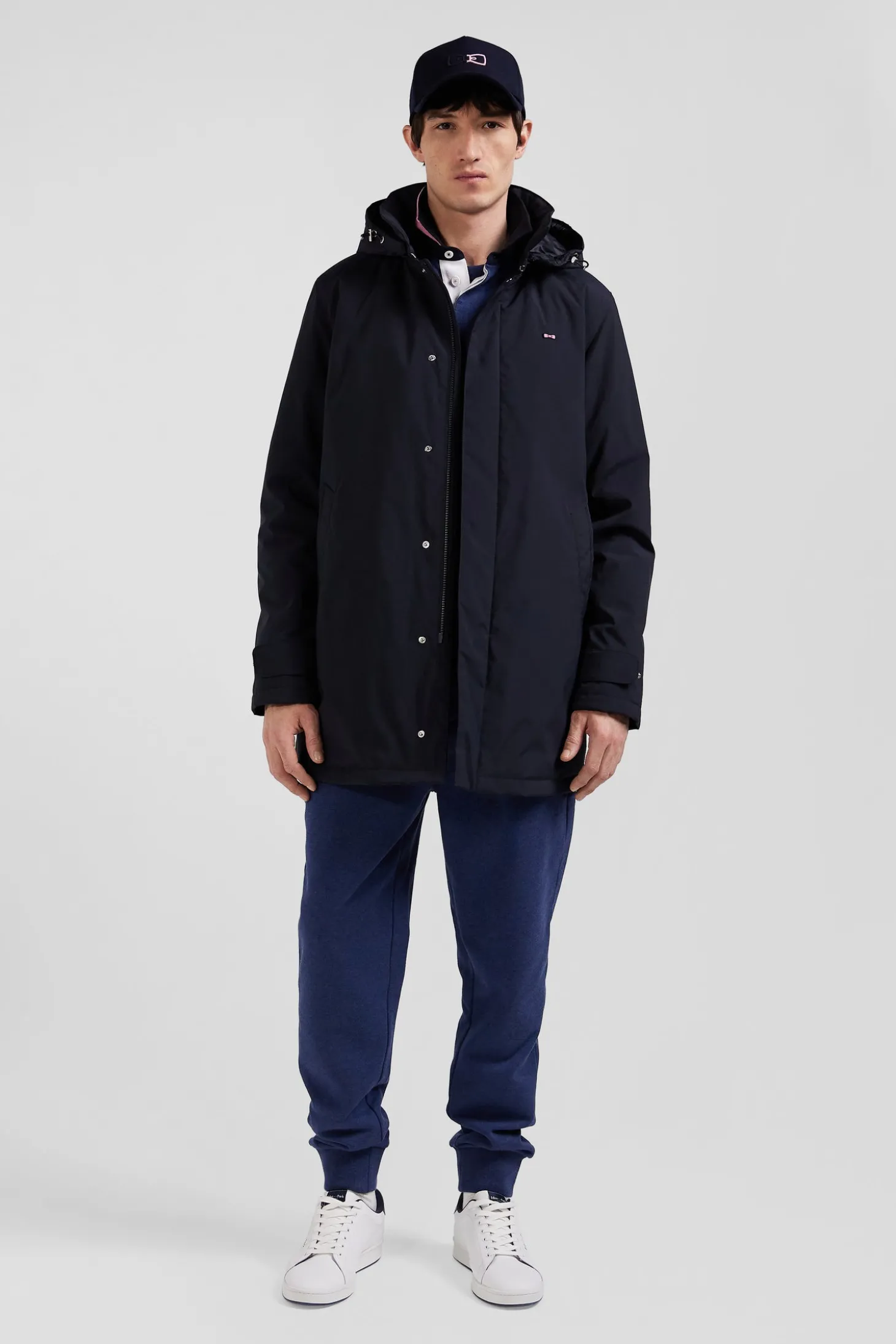 Navy blue hooded nylon raincoat