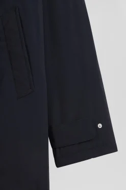 Navy blue hooded nylon raincoat