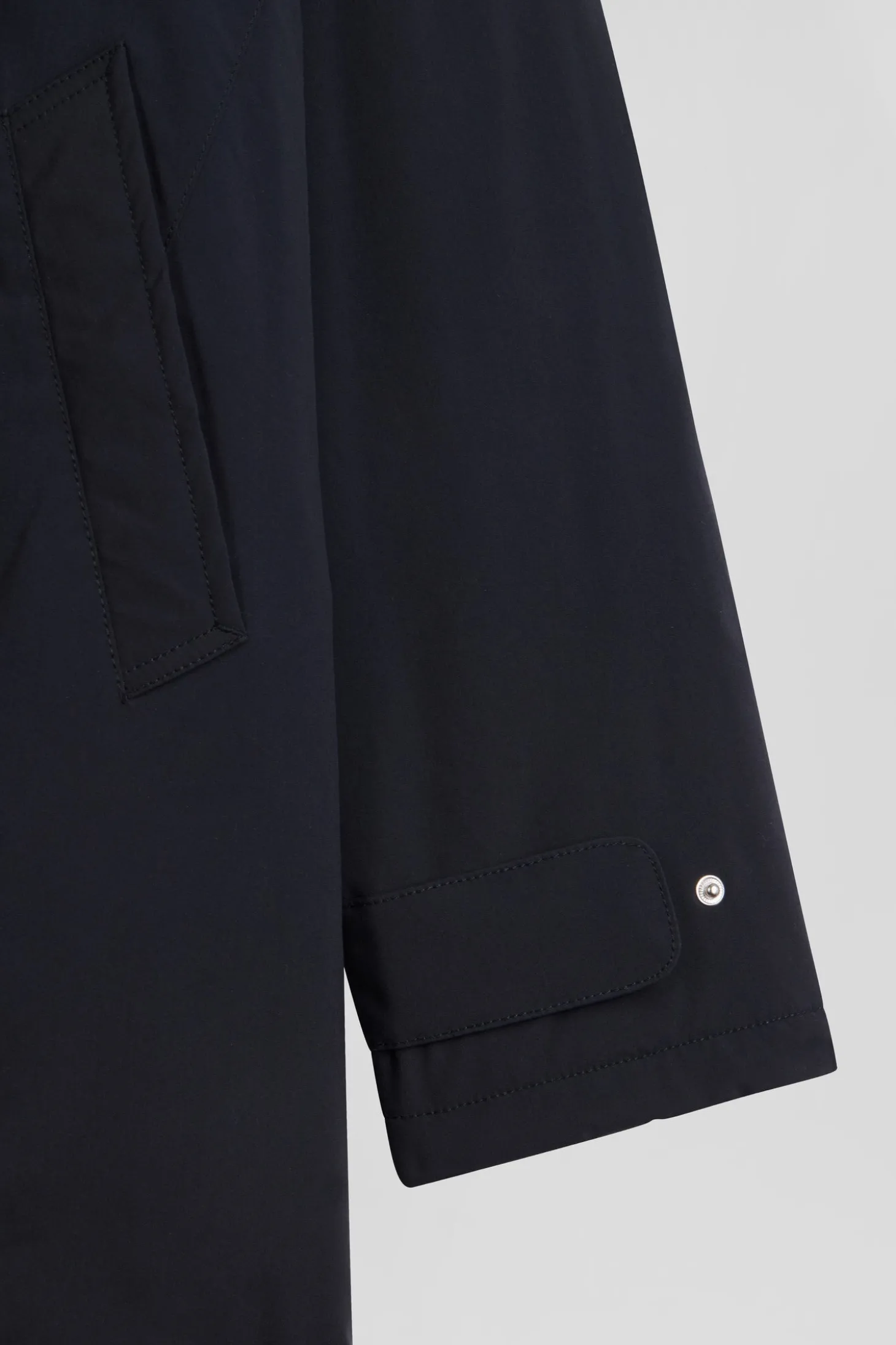 Navy blue hooded nylon raincoat