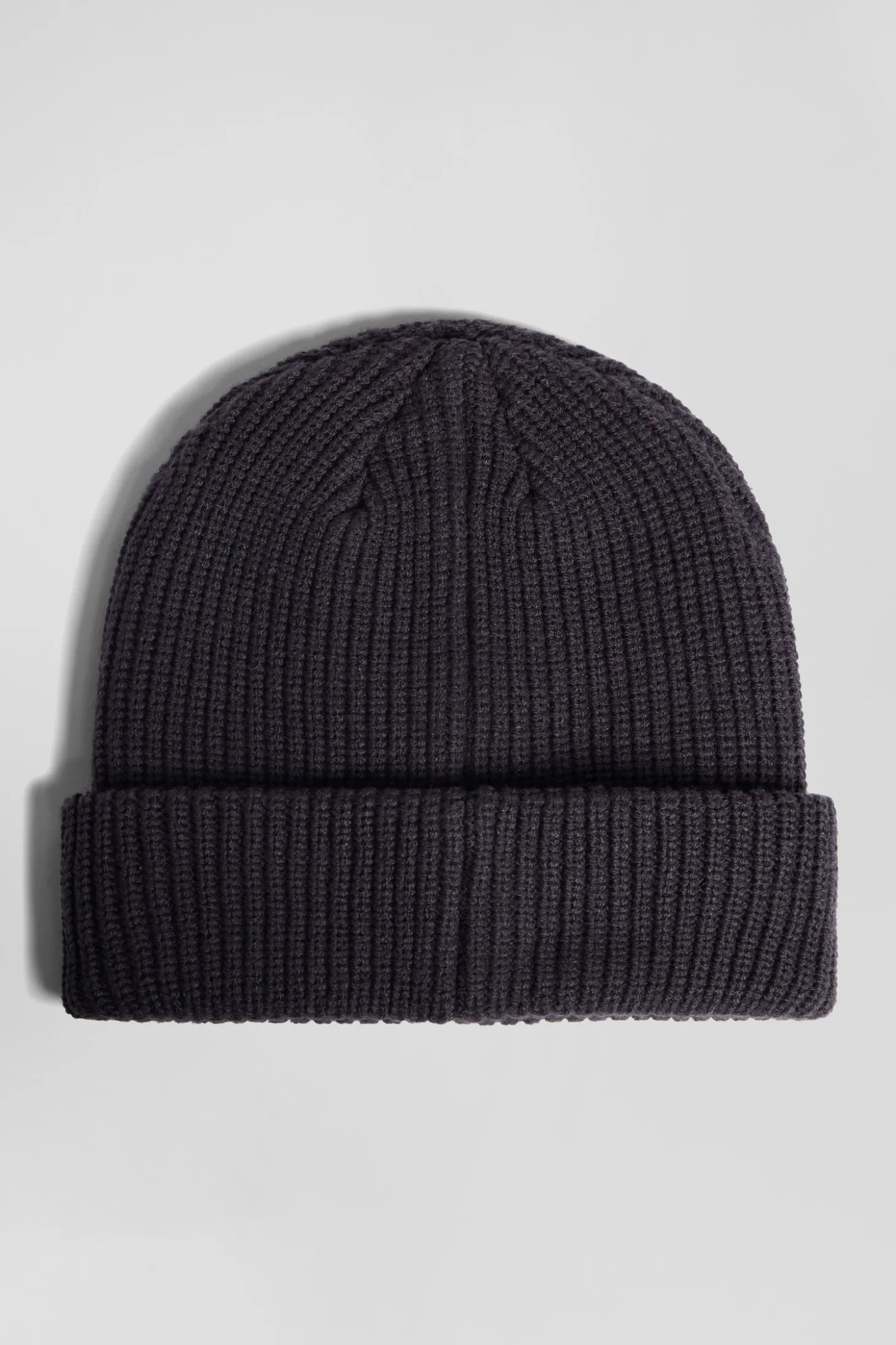Navy blue knitted beanie with bow tie embroidery