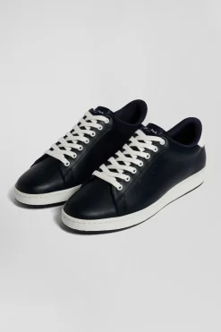 Navy blue low-top leather sneakers