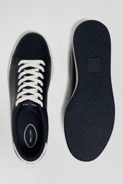 Navy blue low-top leather sneakers