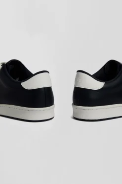 Navy blue low-top leather sneakers