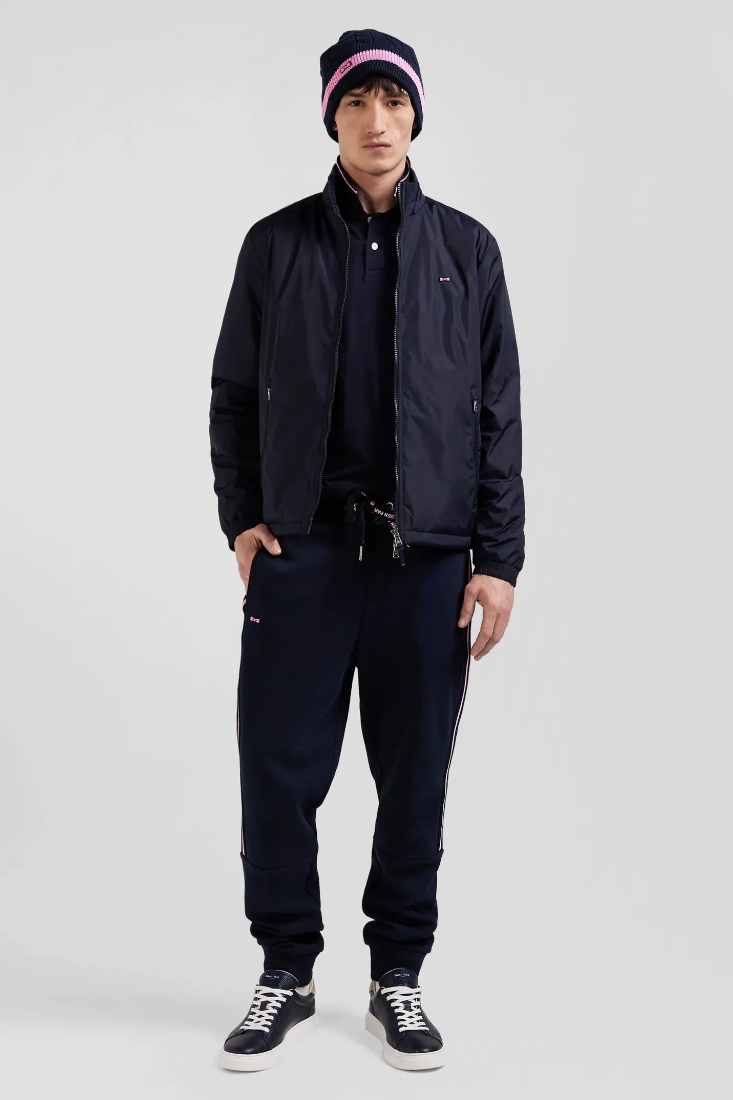 Navy blue matte nylon windbreaker with striped back embroidery