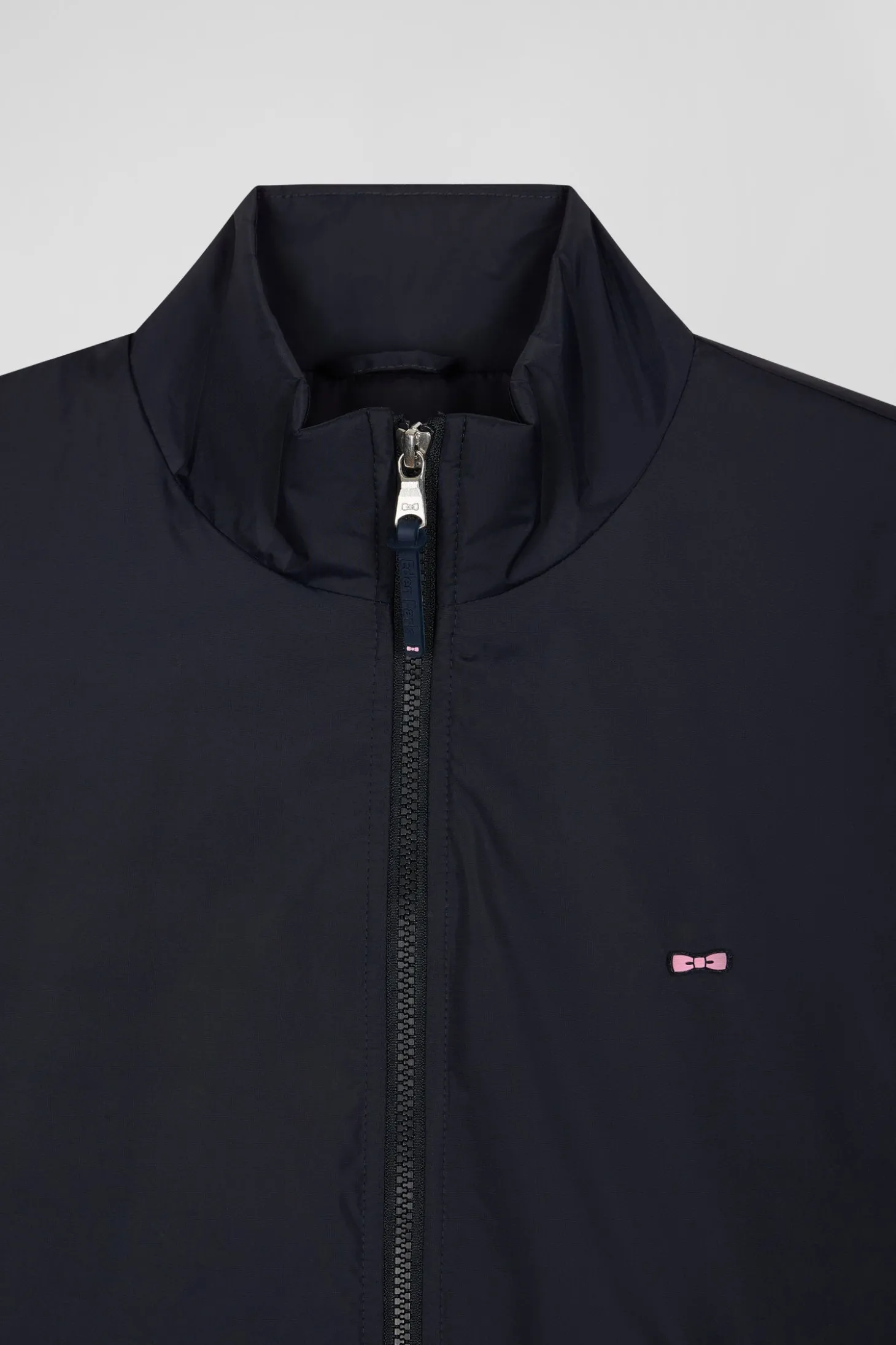 Navy blue matte nylon windbreaker with striped back embroidery