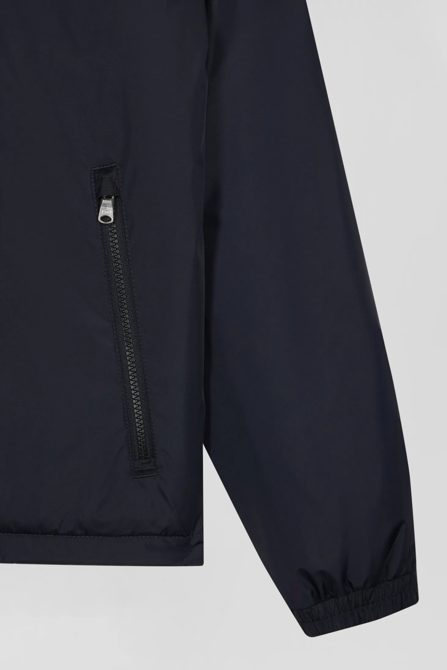 Navy blue matte nylon windbreaker with striped back embroidery