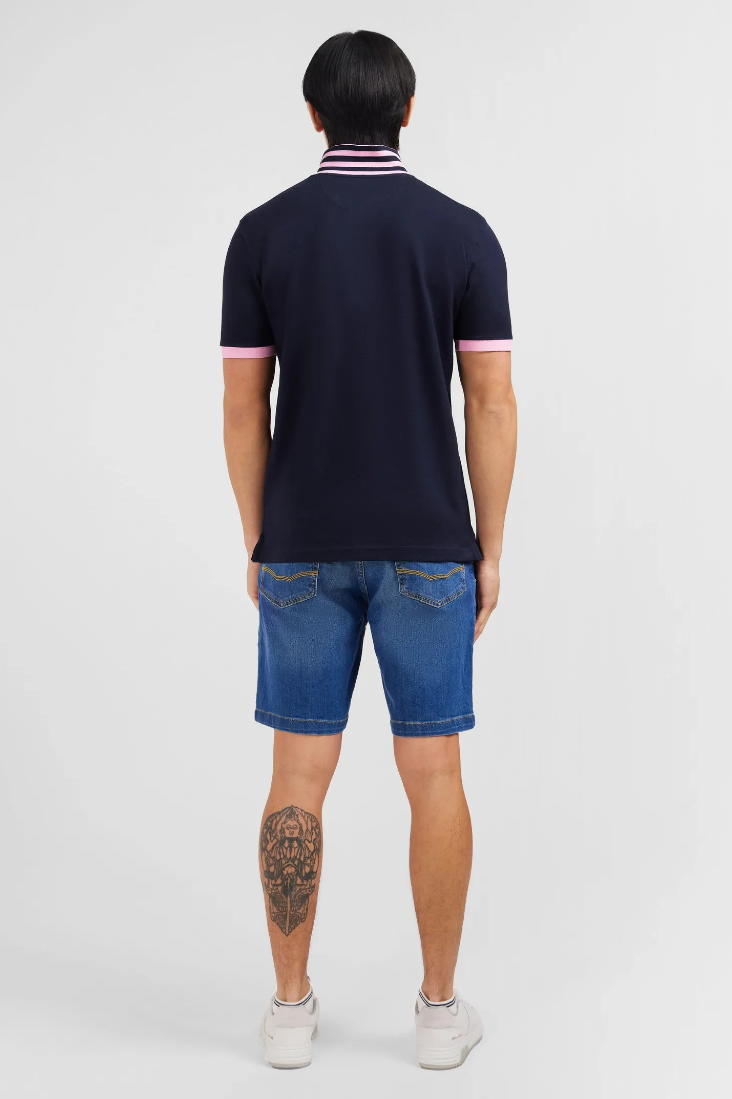 Navy blue pima cotton polo with contrasting accents