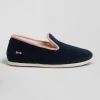 Navy blue shearling slippers with pink trim