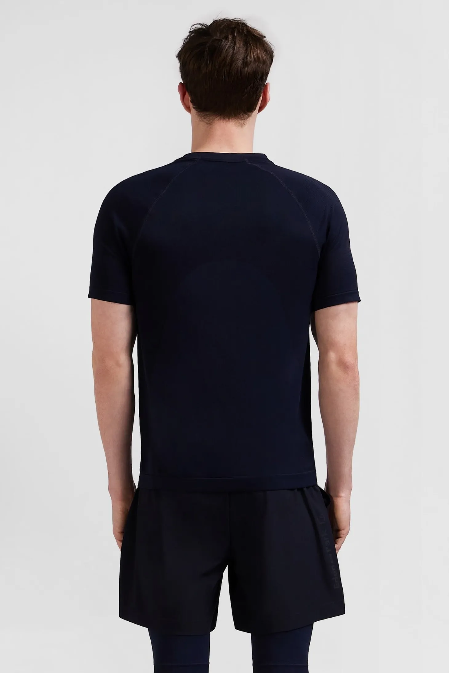 Navy blue short-sleeved sports T-shirt with striped details