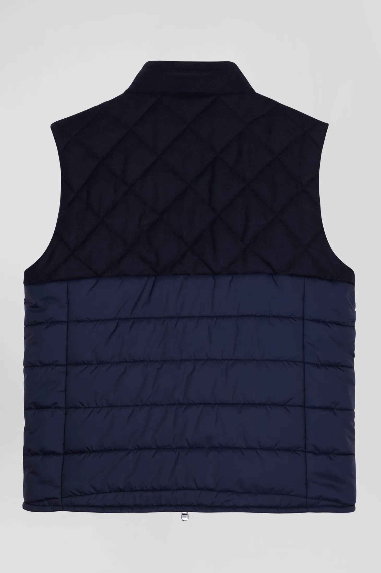 Navy blue sleeveless double quilted high collar down vest