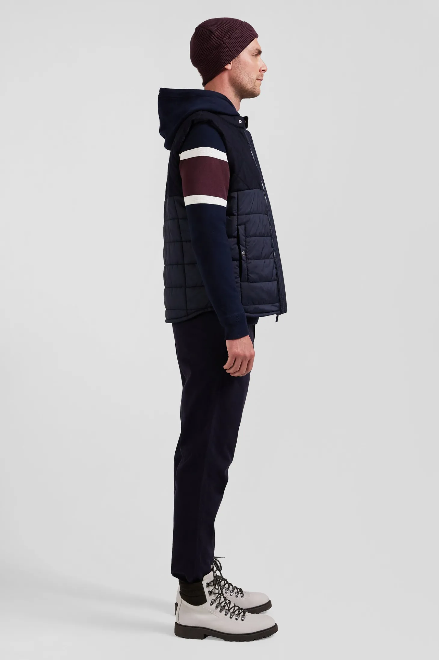 Navy blue sleeveless double quilted high collar down vest