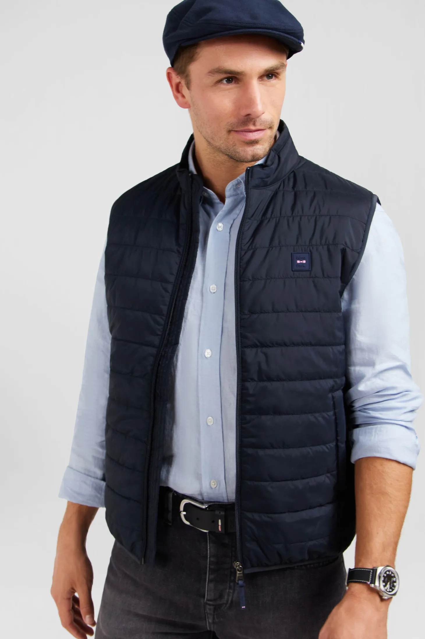 Navy blue sleeveless puffa jacket