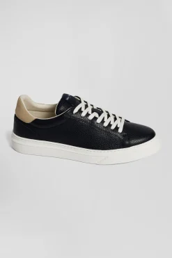 Navy low-top leather sneakers