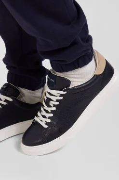 Navy low-top leather sneakers