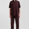 Oversize burgundy short-sleeved cotton piqué polo shirt with tricolor details