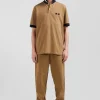 Oversize navy blue short-sleeved cotton piqué polo shirt with tricolor details