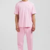 Oversize pink unisex short-sleeved T-shirt in overdyed cotton