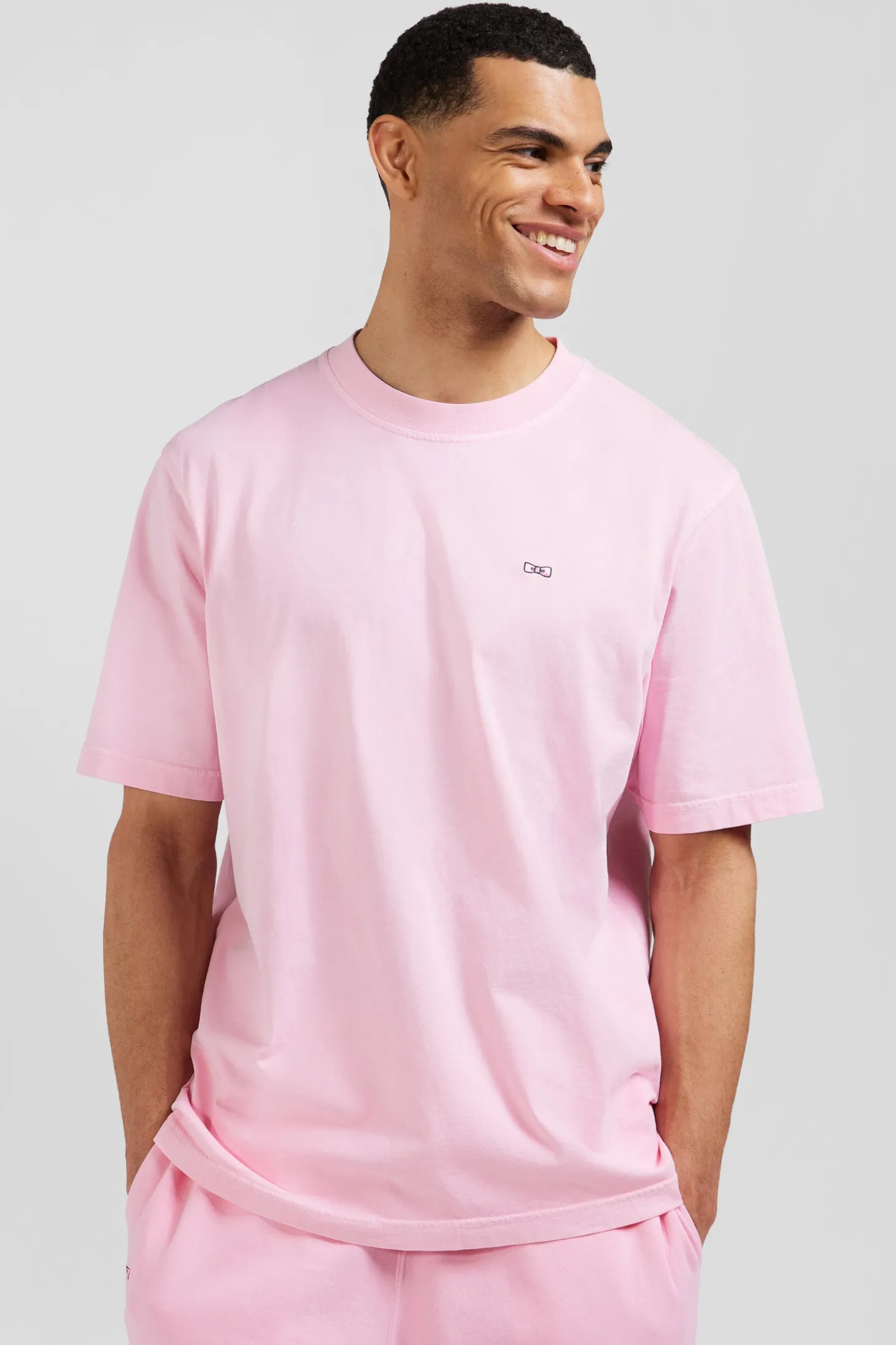 Oversize pink unisex short-sleeved T-shirt in overdyed cotton