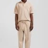 Oversized beige unisex short-sleeved cotton piqué polo shirt