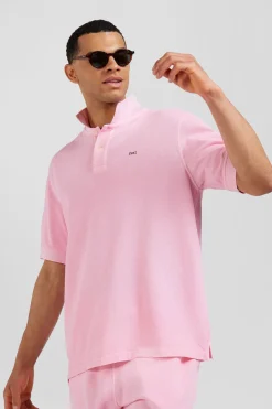 Oversized pink unisex short-sleeved cotton piqué polo shirt